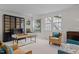 Functional home office featuring built-in shelving and comfortable seating at 2646 Marchmont St, Raleigh, NC 27608
