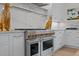 High-end kitchen with professional range, marble countertops, and gold accents at 2646 Marchmont St, Raleigh, NC 27608