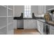 Butler's pantry with ample storage, dark countertops, and a farmhouse sink at 2646 Marchmont St, Raleigh, NC 27608