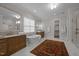 Luxurious bathroom with double vanities, soaking tub, and marble floors at 2646 Marchmont St, Raleigh, NC 27608