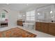 Spa-like bathroom with freestanding tub, marble tile, and walk-in shower at 2646 Marchmont St, Raleigh, NC 27608