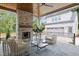 Relaxing outdoor patio with fireplace and seating area, perfect for entertaining at 2646 Marchmont St, Raleigh, NC 27608