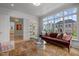 Sunroom with a view and comfortable seating at 2646 Marchmont St, Raleigh, NC 27608