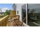 Private deck with wooden chairs and a small table at 752 Dorset Stream Dr, Fuquay Varina, NC 27526