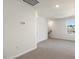 Upstairs bedroom with carpet and window at 209 River Bank Rd, Fuquay Varina, NC 27526