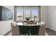 Spacious dining area with large windows and modern decor at 756 Dorset Stream Dr, Fuquay Varina, NC 27526