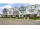 Five townhouses in a row with different exterior features at 756 Dorset Stream Dr, Fuquay Varina, NC 27526