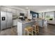 Open concept kitchen with stainless steel appliances and island at 756 Dorset Stream Dr, Fuquay Varina, NC 27526