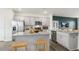 Kitchen with stainless steel appliances and granite island at 756 Dorset Stream Dr, Fuquay Varina, NC 27526