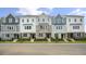 Row of townhouses featuring modern design and landscaping at 756 Dorset Stream Dr, Fuquay Varina, NC 27526