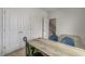 Home office with a desk, built-in shelving and view of the stairs at 756 Dorset Stream Dr, Fuquay Varina, NC 27526