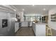 Modern kitchen boasts stainless steel appliances and an island at 756 Dorset Stream Dr, Fuquay Varina, NC 27526