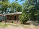 Brick house with a front porch and landscaping at 1222 Hargrove St, Rocky Mount, NC 27801