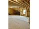 Unfinished bonus room with window and exposed beams at 0 Will Suitt Rd, Butner, NC 27522