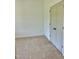 Spacious bedroom with neutral carpeting and double doors to closet at 0 Will Suitt Rd, Butner, NC 27522