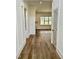 Bright entryway with wood-look flooring and views into the living room at 0 Will Suitt Rd, Butner, NC 27522