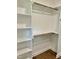 Walk-in closet with hanging rods and shelves at 0 Will Suitt Rd, Butner, NC 27522