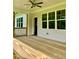Spacious deck with ceiling fan and access to backyard at 0 Will Suitt Rd, Butner, NC 27522
