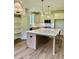 Modern kitchen with large island and stainless steel appliances at 0 Will Suitt Rd, Butner, NC 27522