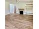 Living room with fireplace and built-in shelving at 0 Will Suitt Rd, Butner, NC 27522