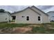 Tan vinyl sided house with a covered porch at 32 Oakfield Trace Dr, Four Oaks, NC 27524