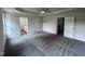 Spacious main bedroom with carpet, and access to bathroom and other rooms at 32 Oakfield Trace Dr, Four Oaks, NC 27524