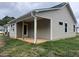 House exterior featuring a covered back porch at 32 Oakfield Trace Dr, Four Oaks, NC 27524