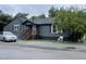 Gray house exterior with a small front porch and yard at 321 Blalock St, Holly Springs, NC 27540