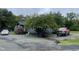 Gray house with cars parked in the driveway at 321 Blalock St, Holly Springs, NC 27540