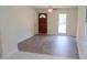 Bright living room featuring hardwood floors and a view of the backyard at 1318 Timothy Avenue Ave, Durham, NC 27707