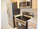 Modern kitchen with stainless steel appliances and granite countertops at 1318 Timothy Avenue Ave, Durham, NC 27707