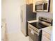Modern kitchen with stainless steel appliances and granite countertops at 1318 Timothy Avenue Ave, Durham, NC 27707