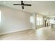 Living room with hardwood floors, recessed lighting and an open concept to the kitchen at 1140 Cottonsprings Dr, Wendell, NC 27591