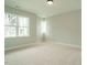 Spacious bedroom with neutral walls and plush carpeting at 1140 Cottonsprings Dr, Wendell, NC 27591