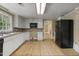 Bright kitchen with white cabinets and laminate countertops at 2430 Langdon Rd, Angier, NC 27501