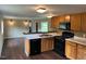 Spacious kitchen featuring ample cabinetry and modern appliances at 2430 Langdon Rd, Angier, NC 27501