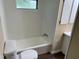 Simple bathroom with a bathtub and a toilet at 2430 Langdon Rd, Angier, NC 27501