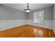 Formal dining room with hardwood floors, wainscoting and chandelier at 441 Mountain Laurel, Chapel Hill, NC 27517