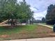 Community playground with playset and picnic tables at 1635 Shepherds Glade Dr, Apex, NC 27523