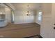 Bright dining room with chandelier and wainscoting at 154 Wilderness Trl, Smithfield, NC 27577