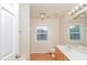 Clean bathroom with shower/tub combo and updated vanity at 216 Stoney Dr, Durham, NC 27703