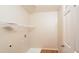 Laundry room with built-in shelving and a utility sink at 216 Stoney Dr, Durham, NC 27703