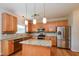 Kitchen with granite countertops, stainless steel appliances, and an island at 216 Stoney Dr, Durham, NC 27703