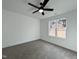 Bright bedroom with ceiling fan and neutral carpeting at 50 Fetterbush Way, Clayton, NC 27520