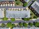 Aerial view of townhouses with community parking at 128 Dove Cottage Ln, Cary, NC 27519