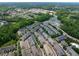 Aerial view of townhome community and surrounding area at 128 Dove Cottage Ln, Cary, NC 27519