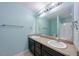 Double vanity bathroom with a large mirror at 128 Dove Cottage Ln, Cary, NC 27519
