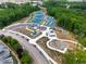 Community amenities include tennis courts, playground, and garden at 128 Dove Cottage Ln, Cary, NC 27519
