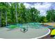 Unique playground structure with hanging hammocks at 128 Dove Cottage Ln, Cary, NC 27519