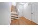 Clean and bright staircase with hardwood floors at 128 Dove Cottage Ln, Cary, NC 27519